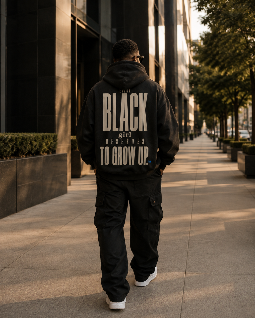 Every Black Girl Deserves to Grow Up Premium Oversized Hoodie PODpartner