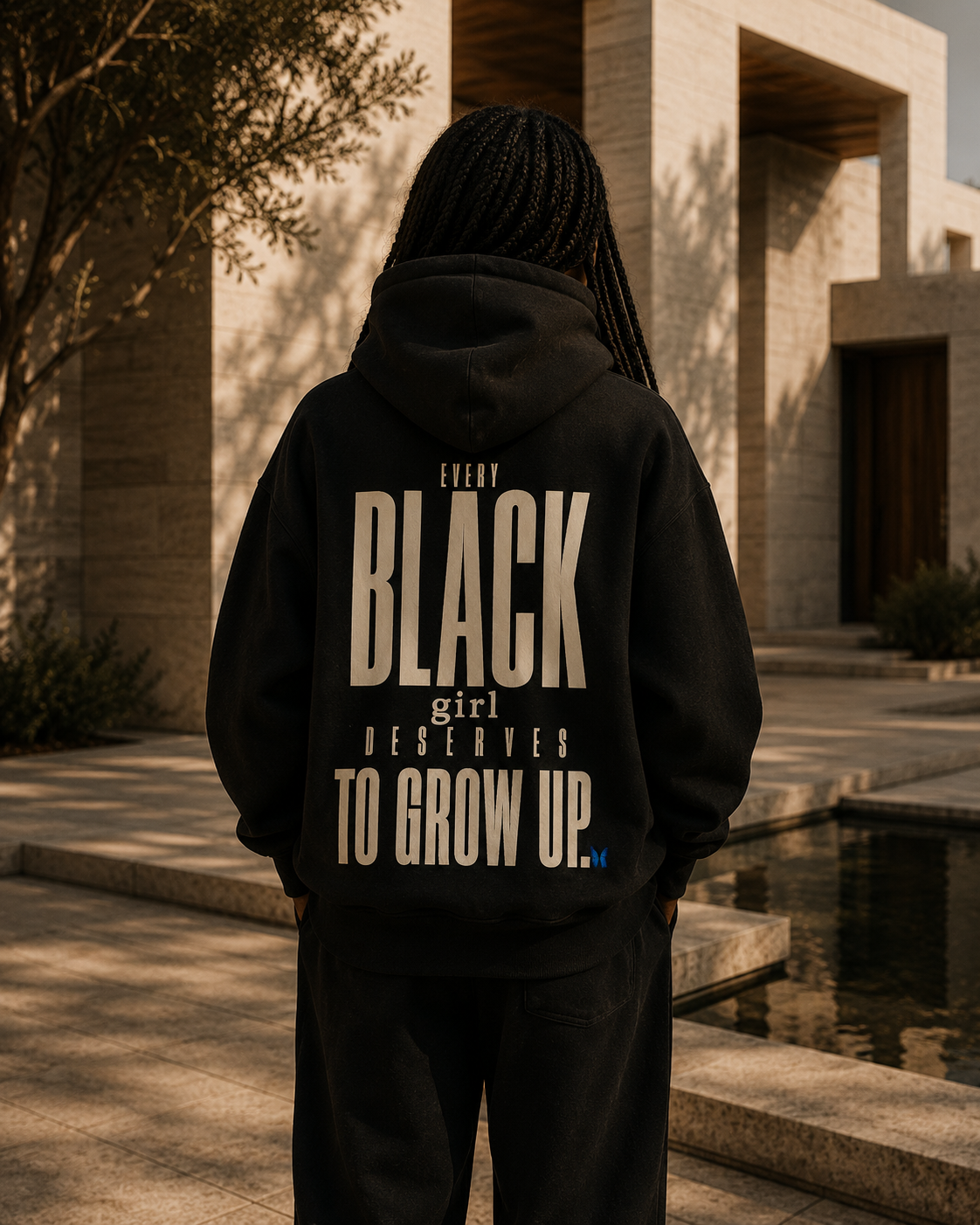Every Black Girl Deserves to Grow Up Premium Oversized Hoodie PODpartner