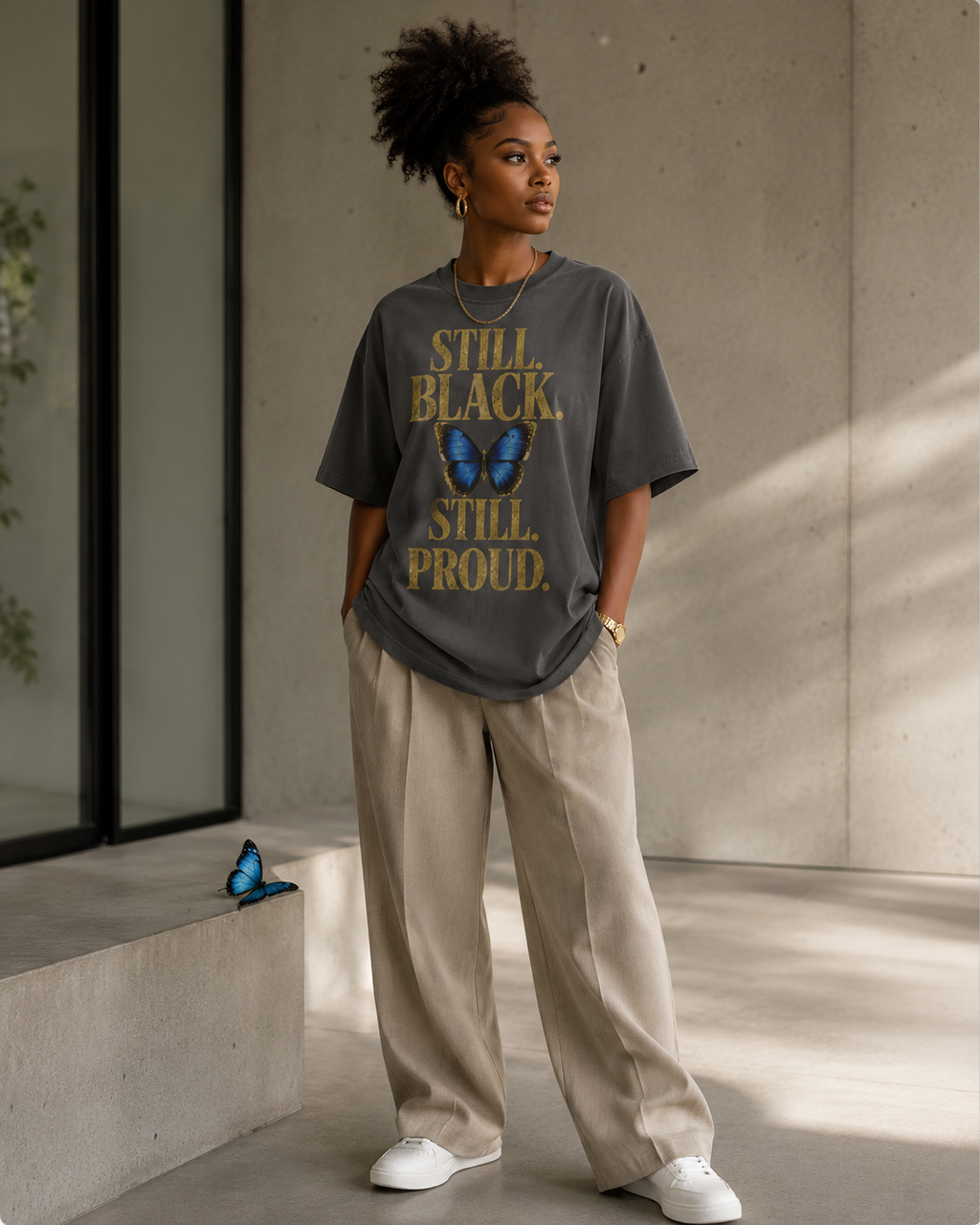 Still. Black. Still. Proud. | Premium Statement Graphic T-Shirt