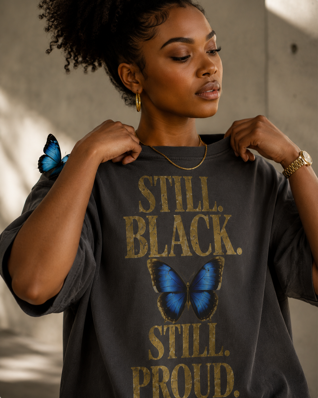 Still. Black. Still. Proud. | Premium Statement Graphic T-Shirt