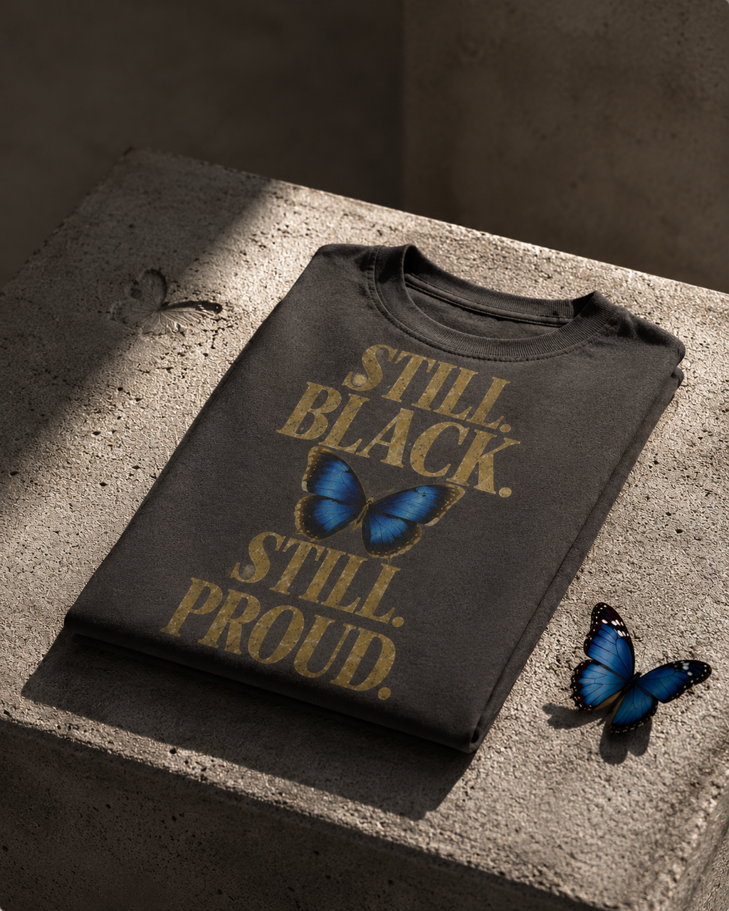 Still. Black. Still. Proud. | Premium Statement Graphic T-Shirt